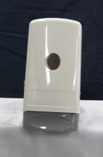 grey wall mount dispenser with dark grey handle at bottom